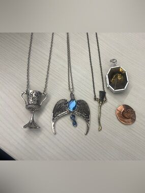 Silver-tone Harry Potter Pendant Necklace with Blue Gem Accent